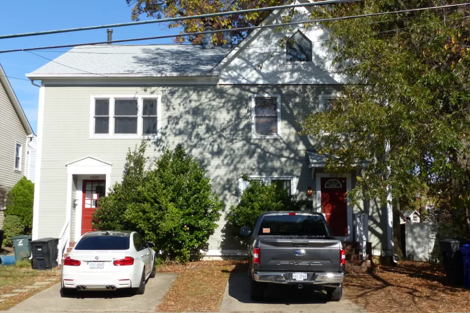 Wooden duplex home with two driveways in Arlington, Virginia